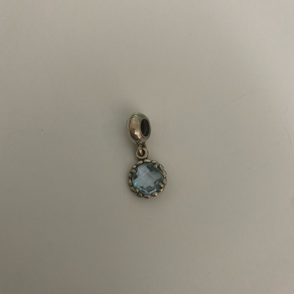 Pandora Jewelry - Pandora Cool Breeze sterling silver dangle charm with blue topaz. Retired